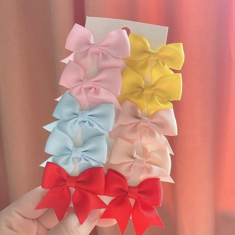 Pack of 10 Baby Ribbon Bowknot in Yellow, Blue , Red, and Pink